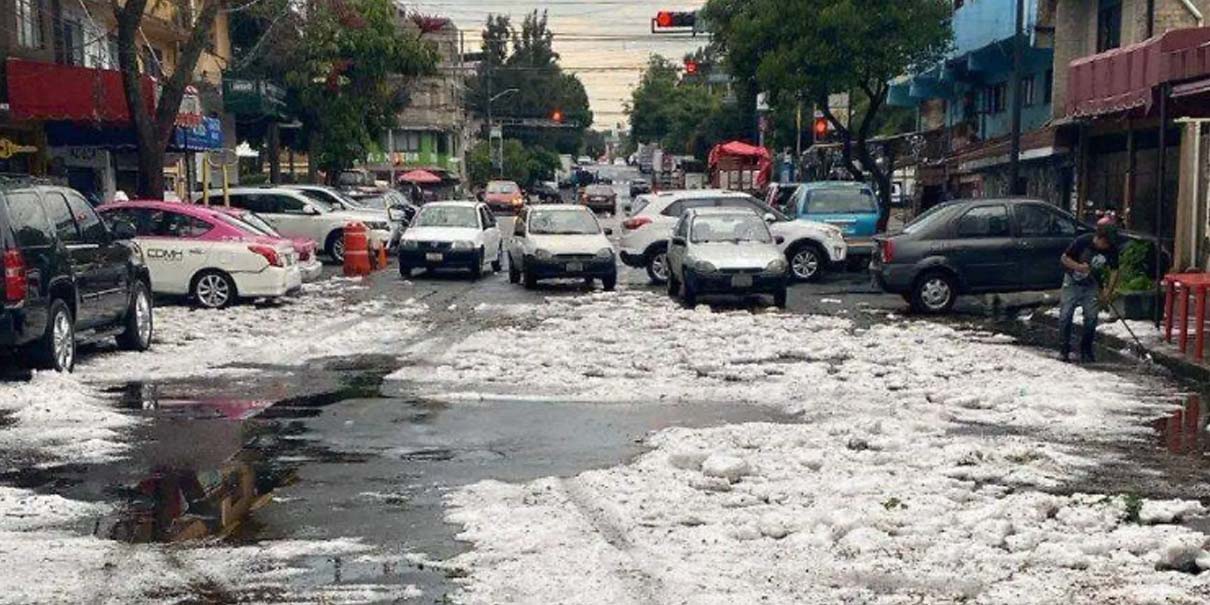 Fuerte granizada en CDMX provoca inundaciones y pinta calles de blanco